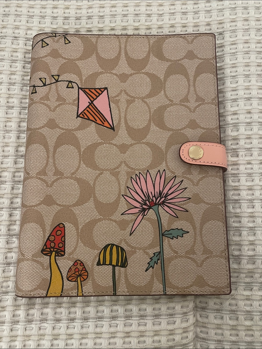 Coach Tan Signature Canvas Cover with Pink Floral & Mushroom Motif